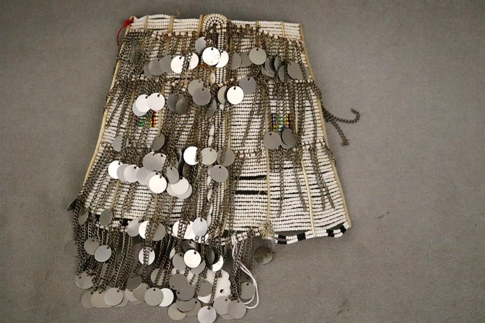 TANZANIAN MAASAI PEOPLES WRISTBAND. - Length: 8 inches.: TANZANIAN MAASAI PEOPLES WRISTBAND. Wristband ("emusitai engaina") made of glass beads, metal chains and disks, cotton and polyester thread. Such wristbands are a form of nonverbal communication that