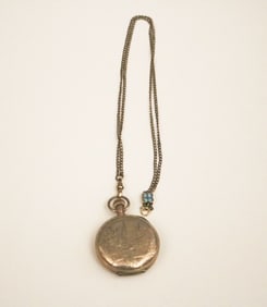 LATE 19TH CENTURY LADY'S YELLOW GOLD-PLATED HUNTING CASE PENDANT WATCH ON CHAIN. By Illinois Watch