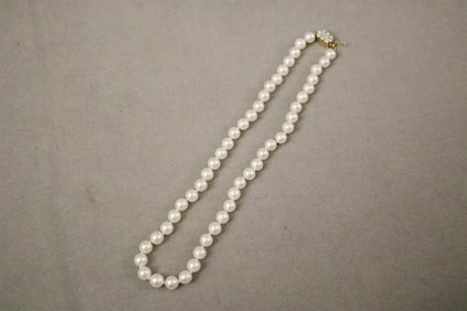 MATCHED CULTURED PEARL CHOKER WITH 14K YELLOW GOLD AND PRECIOUS WHITE OPAL CABOCHON CLASP.