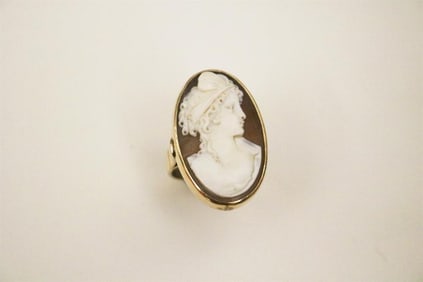 BRIGHT-POLISHED YELLOW GOLD AND CARVED SHELL CAMEO OVAL RING,
