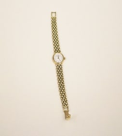 LADY'S BAUME & MERCIER 14K (585) YELLOW GOLD WRIST WATCH.