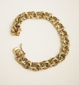 14K YELLOW GOLD ROUND-LINK FLEXIBLE BRACELET WITH TONGUE-AND-GROOVE BOX CLASP,