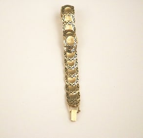 14K YELLOW GOLD FLEXIBLE-LINK BRACELET WATCH. By Natrix.