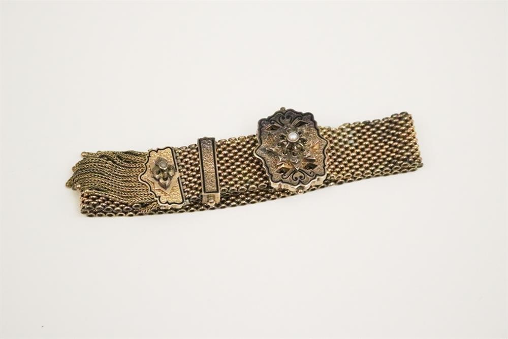 LATE 19TH CENTURY VICTORIAN YELLOW GOLD AND BLACK ENAMEL BELT-DESIGN ADJUSTABLE STRAP BRACELET. - W: (1 of 1)