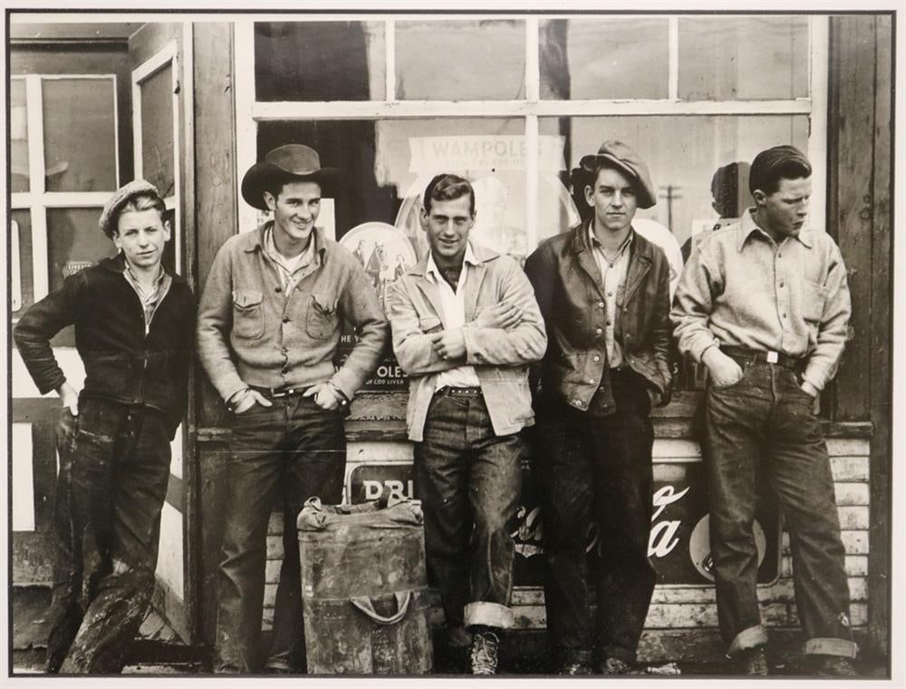 GORDON PARKS (American, 1912 - 2006). Drug store "Cowboys." Black Diamond, Alberta, Canada, October (1 of 13)