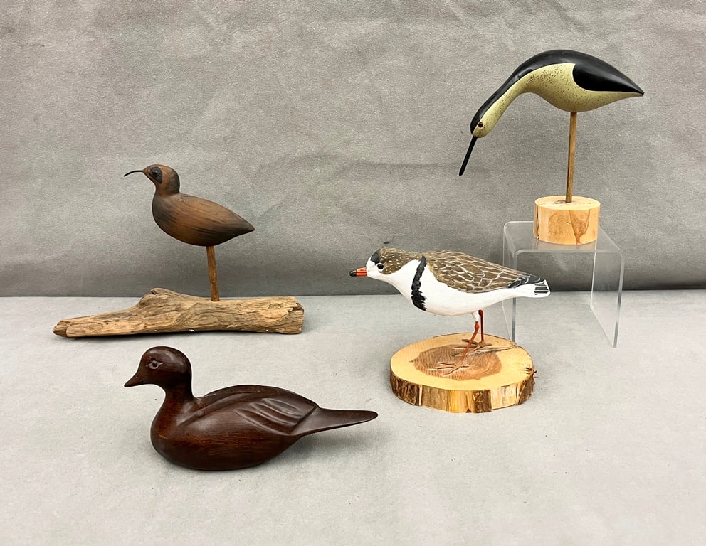 THREE HAND-CARVED AND PAINTED WOODEN FIGURES OF SHOREBIRDS AND ONE WOODEN DUCK. (1 of 20)