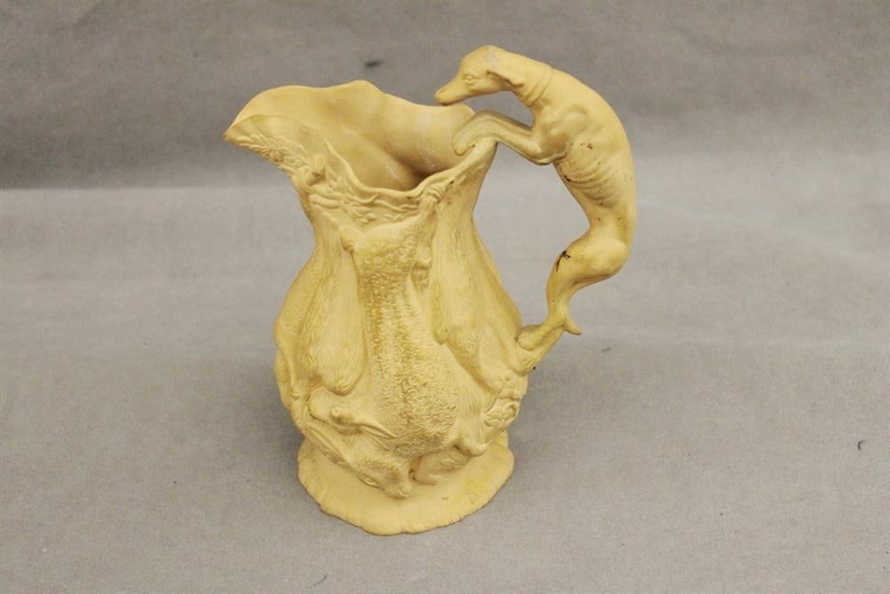 FRENCH BISQUE PITCHER MODELED AS HANGING GAME. 19th century. - H: 7 1/4 in.: FRENCH BISQUE PITCHER MODELED AS HANGING GAME. 19th century. Greyhound modeled handle - H: 7 1/4 in.