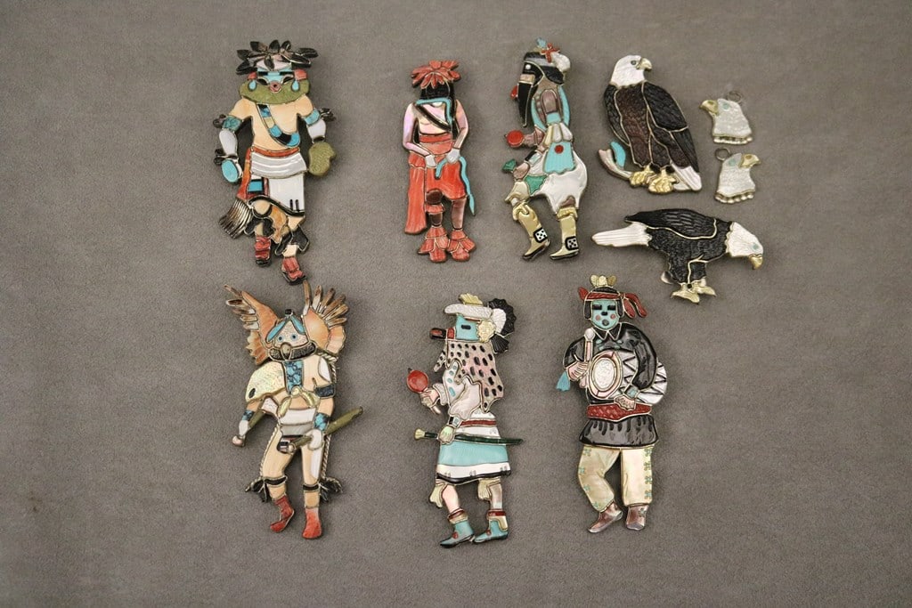 V&S BENN ZUNI CULTURE SILVER JEWELRY (Native American, 20th-21st century).: V&S BENN ZUNI CULTURE SILVER JEWELRY (Native American, 20th-21st century). Eight assorted silver, colored geometric and mother-of-pearl/abalone shell pins and two pendants. Each signed on reverse; si