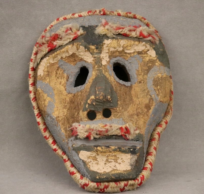 AMERICAN OR MEXICAN UNIDENTIFIED MASK. - height: 10 inches.: AMERICAN OR MEXICAN UNIDENTIFIED MASK. Patinated hand-carved from wood and featuring painted details - height: 10 inches.