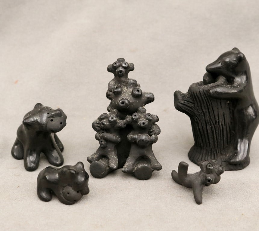 FIVE ASSORTED SANTA CLARA PUEBLO, BLACK MUDMEN, POTTERY. - Height (storyteller) 3 inches. (1 of 20)