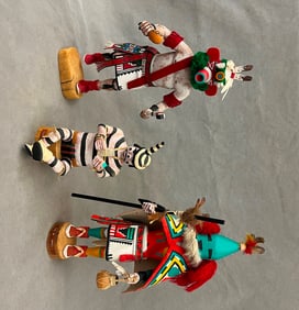 THREE KACHINA DOLLS FROM PUEBLO NATIVE TRIBES PRIMARILY THE HOPI AND ZUNI.