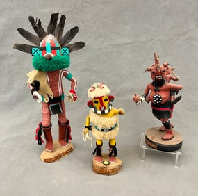 THREE KACHINA DOLLS FROM PUEBLO NATIVE TRIBES PRIMARILY THE HOPI AND ZUNI.