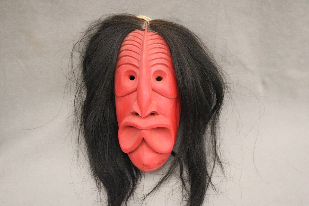 IROQUOIS HAUDENOSAUNEE FALSE FACE SOCIETY MASK,: IROQUOIS HAUDENOSAUNEE FALSE FACE SOCIETY MASK. Carved mask used in the healing rituals of the False Face Society. These masks are used by the members of the society to represent various powerful spi
