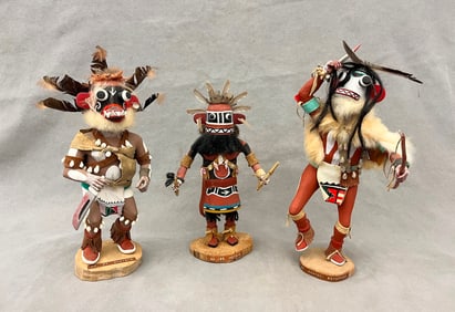 THREE KACHINA DOLLS FROM PUEBLO NATIVE TRIBES PRIMARILY THE HOPI AND ZUNI.