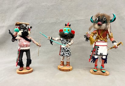 THREE KACHINA DOLLS FROM PUEBLO NATIVE TRIBES PRIMARILY THE HOPI AND ZUNI.