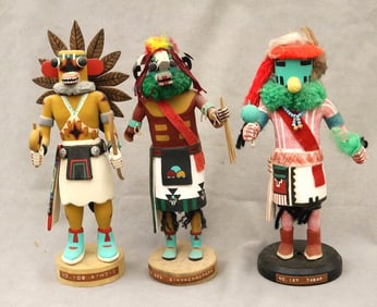 THREE KACHINA DOLLS FROM PUEBLO NATIVE TRIBES PRIMARILY THE HOPI AND ZUNI.