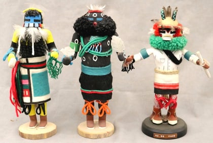 THREE KACHINA DOLLS FROM PUEBLO NATIVE TRIBES PRIMARILY THE HOPI AND ZUNI.