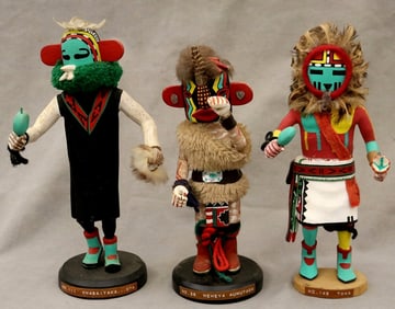 THREE KACHINA DOLLS FROM PUEBLO NATIVE TRIBES PRIMARILY THE HOPI AND ZUNI.