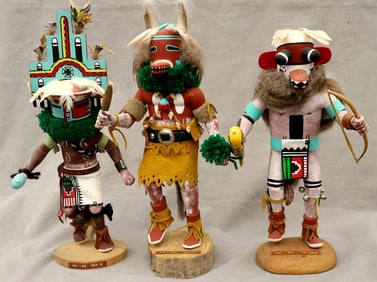 THREE KACHINA DOLLS FROM PUEBLO NATIVE TRIBES PRIMARILY THE HOPI AND ZUNI.