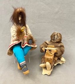 TWO TRADITIONAL ALASKAN NATIVE CULTURAL DOLLS, - Height: (Tallest doll): 14.5 inches.