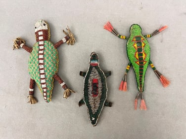 THREE PLAINS NATIVE AMERICAN BEADED UMBILICAL AMULETS, - Length: (approx.) 8 inches.