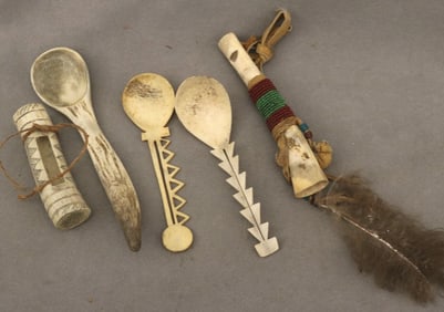 FOUR ASSORTED NATIVE AMERICAN BONE CARVED AND DECORATED ARTIFACTS, - Spoon length: 7.25 inches.