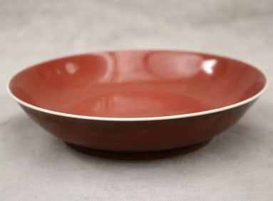 CHINESE SANG-DE-BOEUF GLAZED PORCELAIN SHALLOW CIRCULAR BOWL, - D: 7 1/4 in.