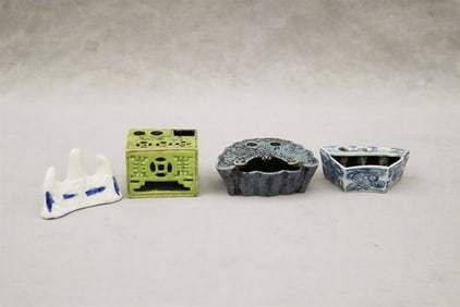 FOUR CHINESE DESK OR SCHOLAR'S PORCELAIN ACCESSORIES.