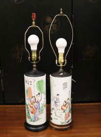 TWO CHINESE POLYCHROMED FIGURAL DECORATED CYLINDRICAL PORCELAIN VASES MOUNTED AS ELECTRIFIED TABLE