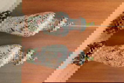 PAIR OF CHINESE FAMILLE ROSE PORCELAIN BALUSTER-FORM LIFT-COVER VASES. 19th century. - H: 45 in.