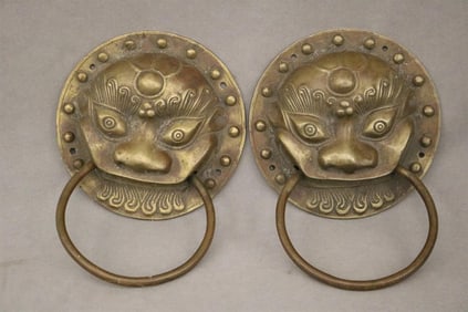 PAIR CHINESE BRASS CIRCULAR DOOR KNOCKERS CAST AS MASKS OF FU LIONS, - D; 7 1/2 in.