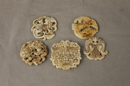 GROUP SIX CHINESE CARVED AND PIERCED WHITE STONE AMULETS, - Largest, D: 3 in,.