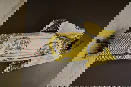 CHINESE YELLOW-GOLD SILK ROBE WITH WOVEN TRIM AND MEDALLIONS DEPICTING FIVE-TOED DRAGONS ,