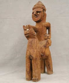 PAKISTANI KALASH GANDAU WOODEN FUNERARY FIGURE OF A MALE RIDING A HORSE, late 1960s. - Height: 16