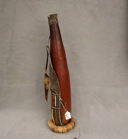 KENYAN MAASAI MILK BLOOK DRINKING VESSEL. - Length: 20.25 inches.