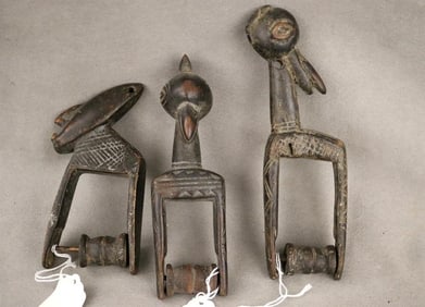 IVORY COAST SENUFO PEOPLE HEDDLE PULLEYS. - Height: 7.75 inches.