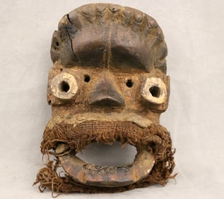 IVORY COAST GREBO WE GUERE MASK. - Height: 8.5 inches.