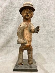 IVORY COAST BAULE PEOPLES WESTERN STYLE STATUETTE. - Height: 18 inches (including base).