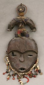 IVORY COAST AKAN GROUP BAULE MASK. - Height 14 inches.