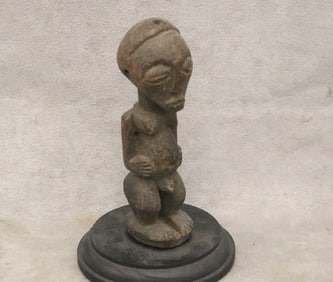 CONGOLESE LUBA HEMBA PEOPLES CARVED WOODEN STATUE. - Height: 7 inches (including base).