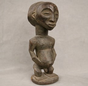 CONGOLESE HEMBA ANCESTOR "SINGITI" FIGURE. - Height 11.75 inches.