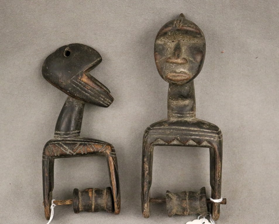 BURKINA FASO LOBI BATEBA PEOPLE HEDDLE PULLEYS, - Height: 6.5 inches.: BURKINA FASO LOBI BATEBA PEOPLE HEDDLE PULLEYS. Set of two patinated hand carved wooden heddle pulleys from the Lobi people of Burkina Faso, Ghana, and Côte d'Ivoire in West Africa. - Height: 6.5 inc