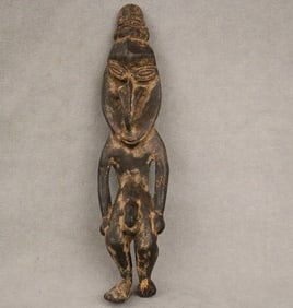 PAPUA NEW GUINEA SEPIK RIVER ANCESTRAL OR AMULET FIGURE, - Height: 10.5 inches.
