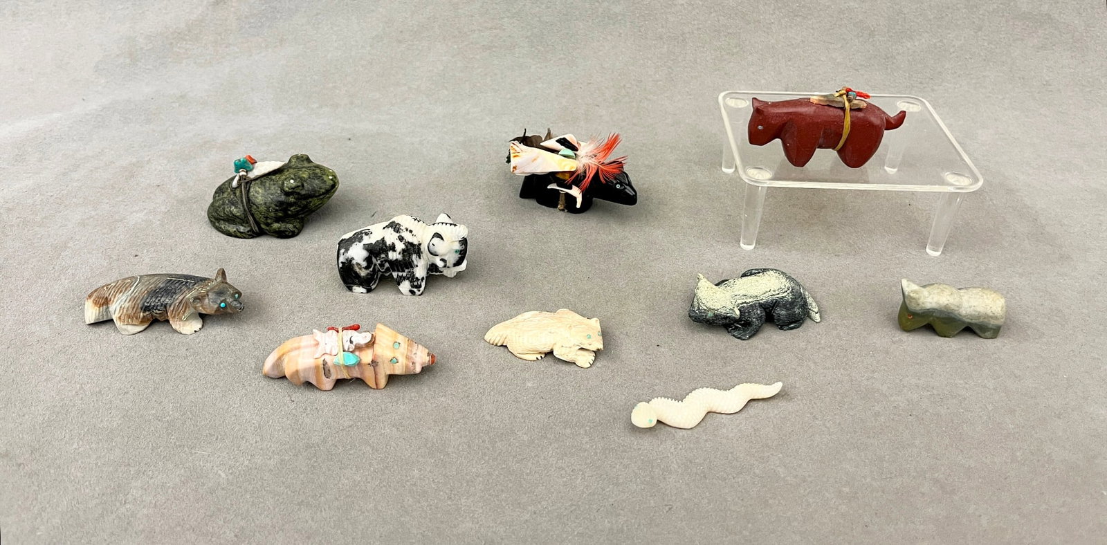 TEN ASSORTED ZUNI FETISH CARVINGS, NEW MEXICO, TRADITIONAL ART OF THE NATIVE AMERICAN SOUTHWEST.: TEN ASSORTED ZUNI FETISH CARVINGS, NEW MEXICO, TRADITIONAL ART OF THE NATIVE AMERICAN SOUTHWEST. Set of ten vintage assorted Zuni Fetish carvings from the Zuni Pueblo in New Mexico, part of the tradit