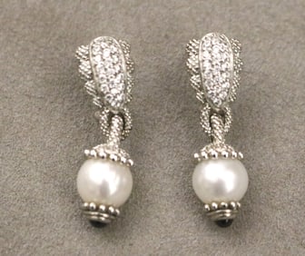 PAIR SIGNED JUDITH RIPKA STERLING SILVER AND CUBIC ZIRCONIA DROP EARRINGS WITH POST-CLIP BACKS.