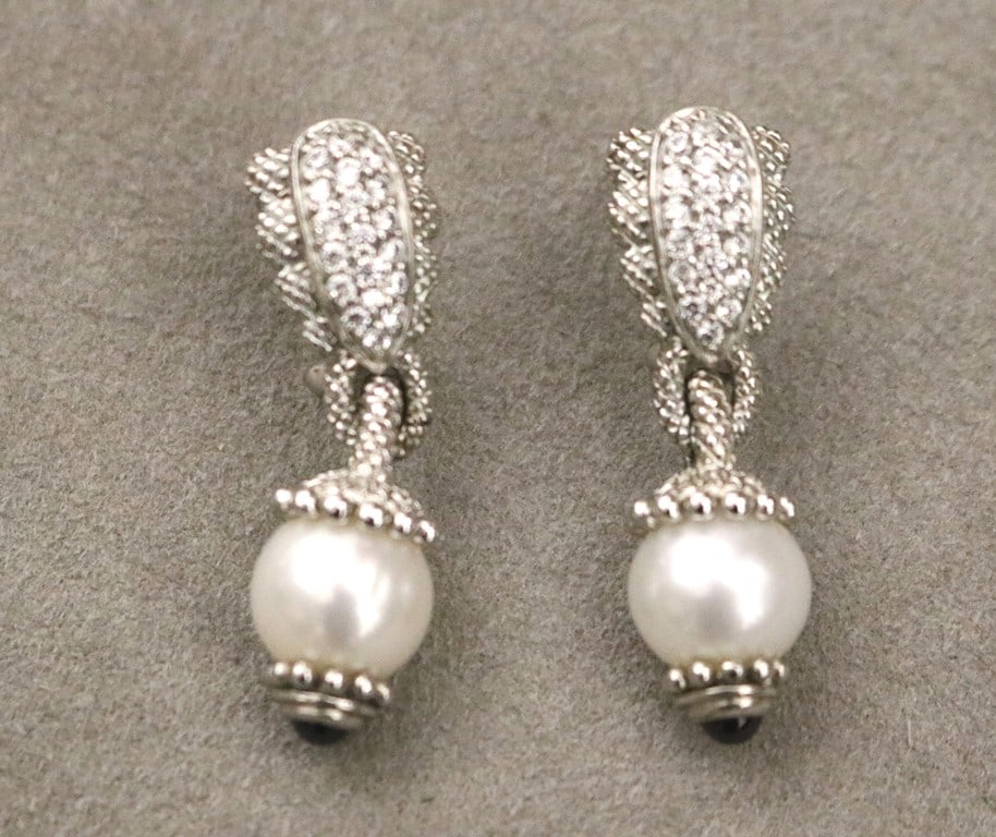 PAIR SIGNED JUDITH RIPKA STERLING SILVER AND CUBIC ZIRCONIA DROP EARRINGS WITH POST-CLIP BACKS.