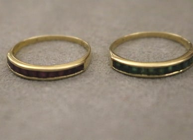 PAIR 14K YELLOW GOLD AND COLORED GEMSTONE GUARD BANDS.
