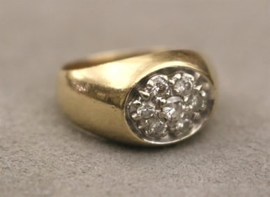 14K YELLOW AND WHITE GOLD AND DIAMOND CLUSTER DOME RING. - Ring size: 8 1/2. Gross wt. 5 dwt.