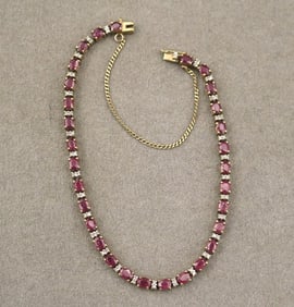 14K YELLOW GOLD, RUBY AND DIAMOND FLEXIBLE LINK BRACELET,