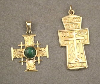TWO 14K YELLOW GOLD RELIGIOUS CROSS PENDANTS.